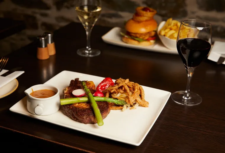 A juicy steak served at the Alamo Steakhouse (source: Facebook/RiversideParkHotel)