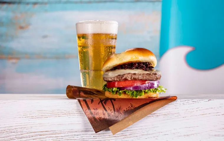 A burger and a class of beer, at Surfside Inn and Suites Beach Break Cafe. (image provided by Universal)