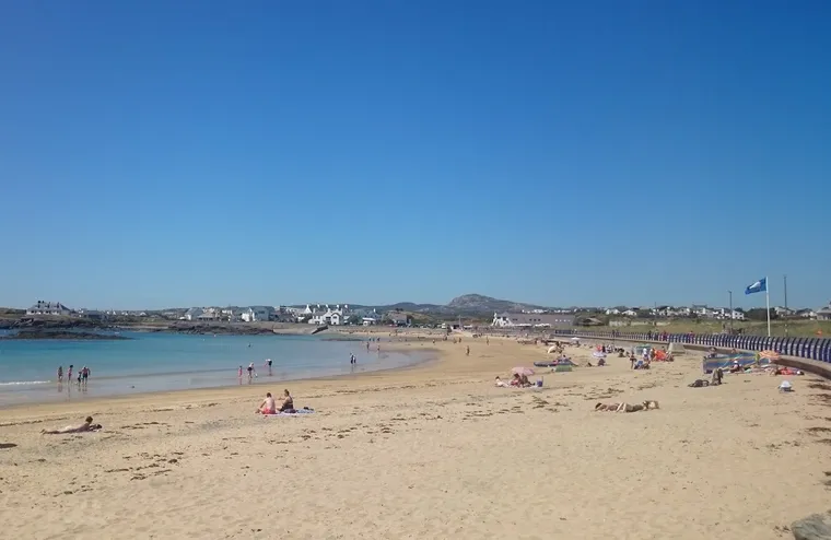 Trearddur Bay beach on a calm and sunny day