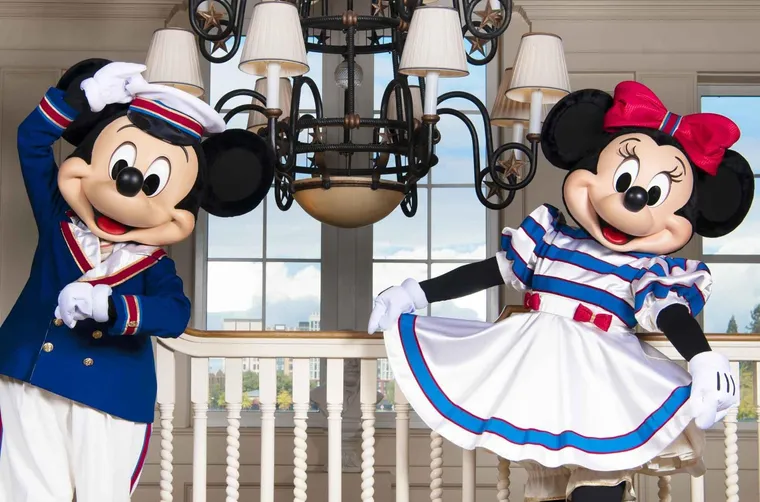 Mickey Mouse and Minnie Mouse in unique resort attire at Newport Bay Club hotel at Disneyland Paris